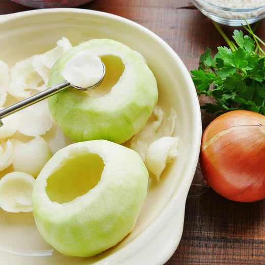 Koken zonder bijkomen: gevulde groenten met gierst en kip uit de oven